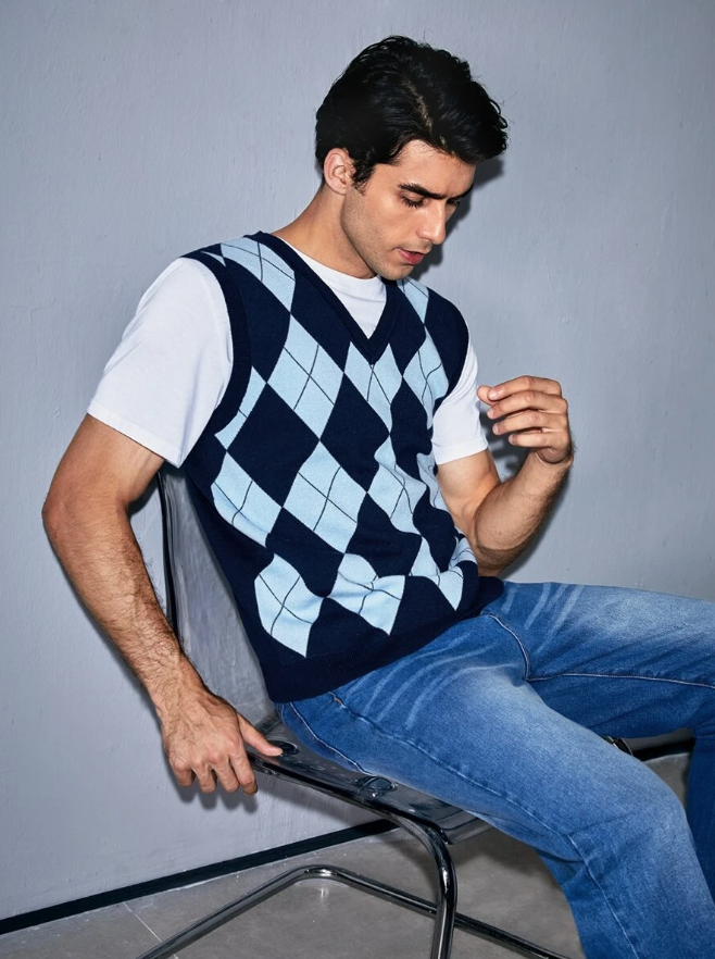 Man wearing fashionable sweater vest.