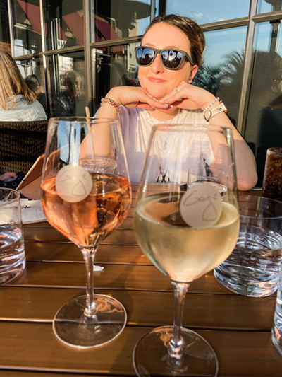 Woman wearing Goodr sunglasses