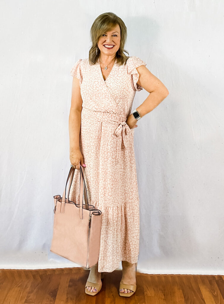 Dianne of The Harper Girls wearing a pink print dress