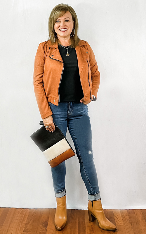 Woman wearing faux suede orange moto jacket for How to Wear it at Any Age Volume 13
