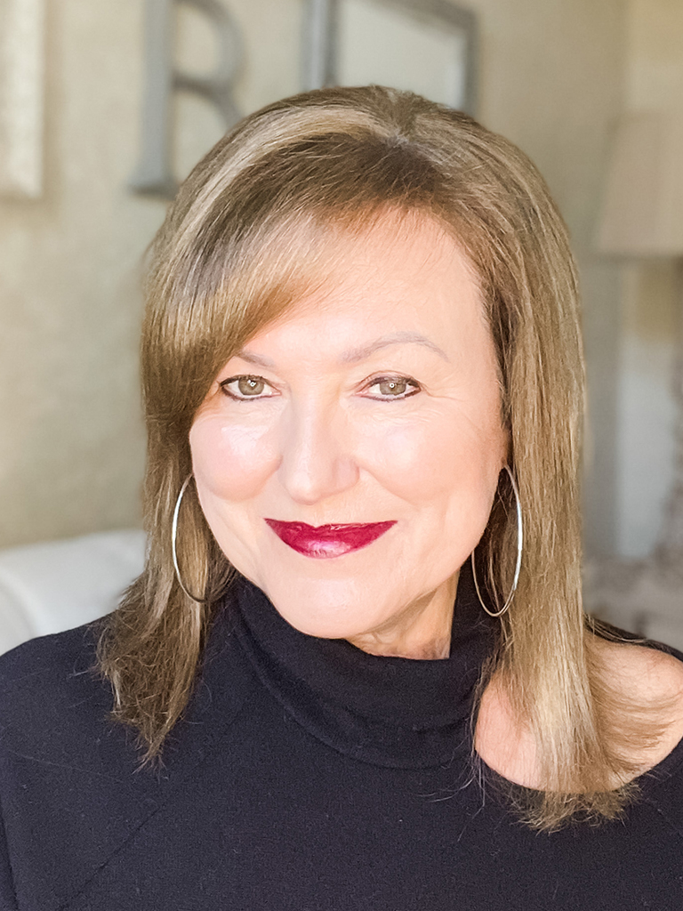 Woman wearing dark lipstick showing beauty at any age