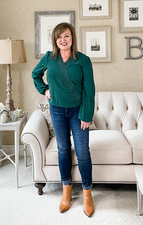 woman wearing forest green blouse