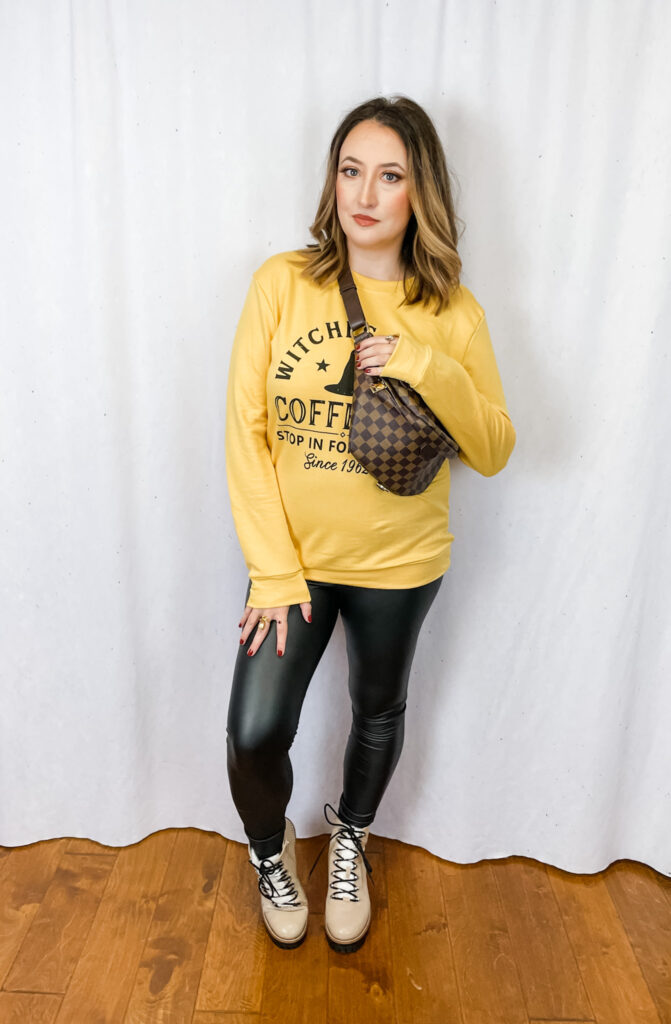 Woman wearing yellow sweatshirt