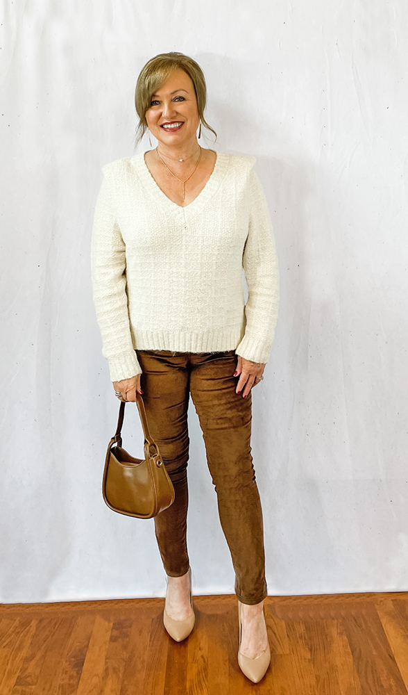 Women wearing cream holiday sweater