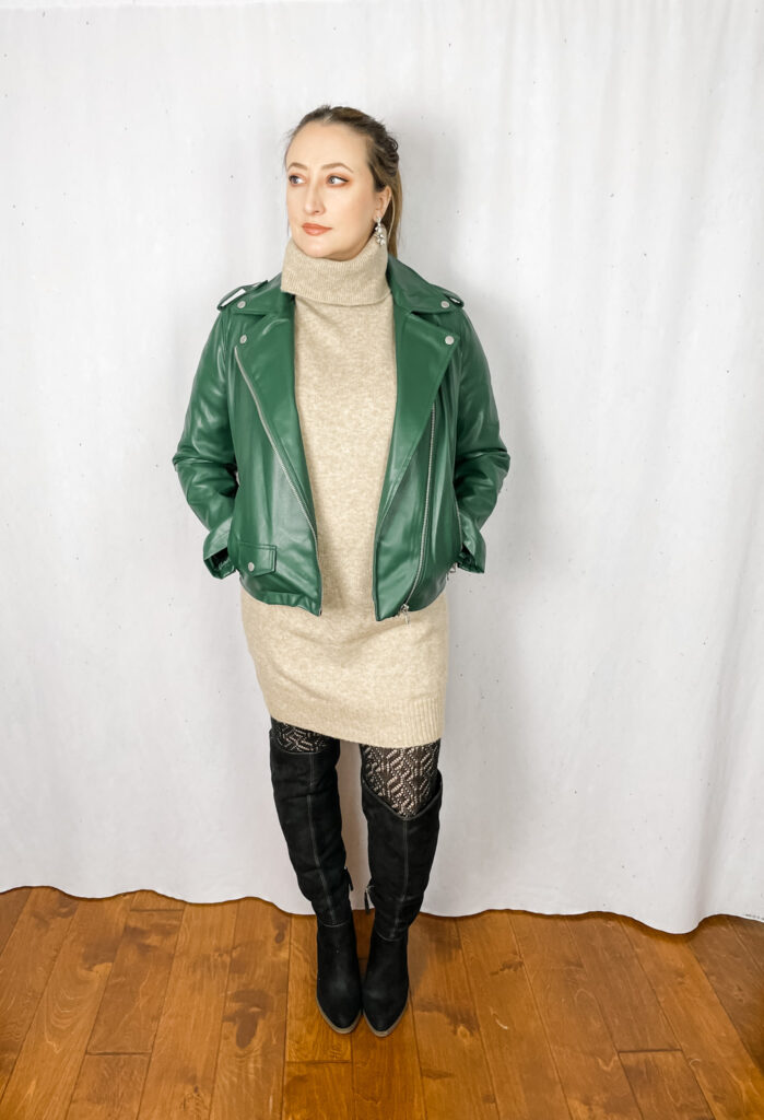how to wear it at any age woman wearing green moto jacket with sweater dress