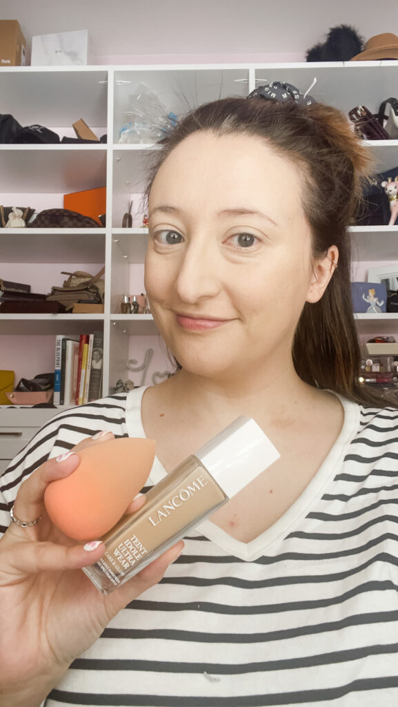 Woman showing foundation