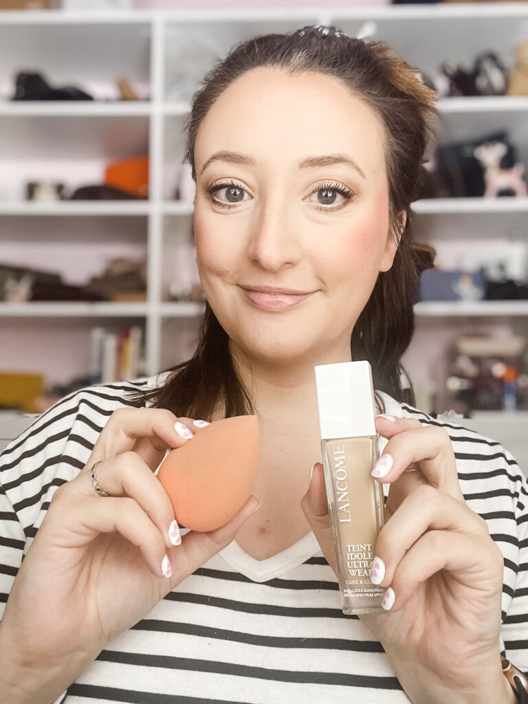Woman looking beautiful wearing foundation
