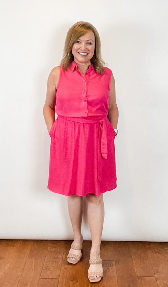 Woman wearing pink clothing pink shirtdress