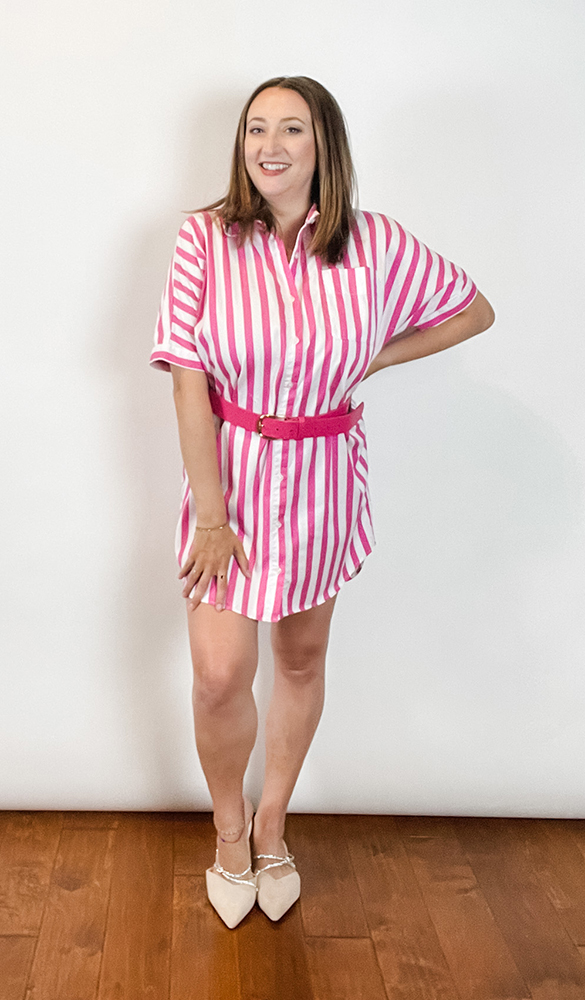 Woman wearing striped pink dress