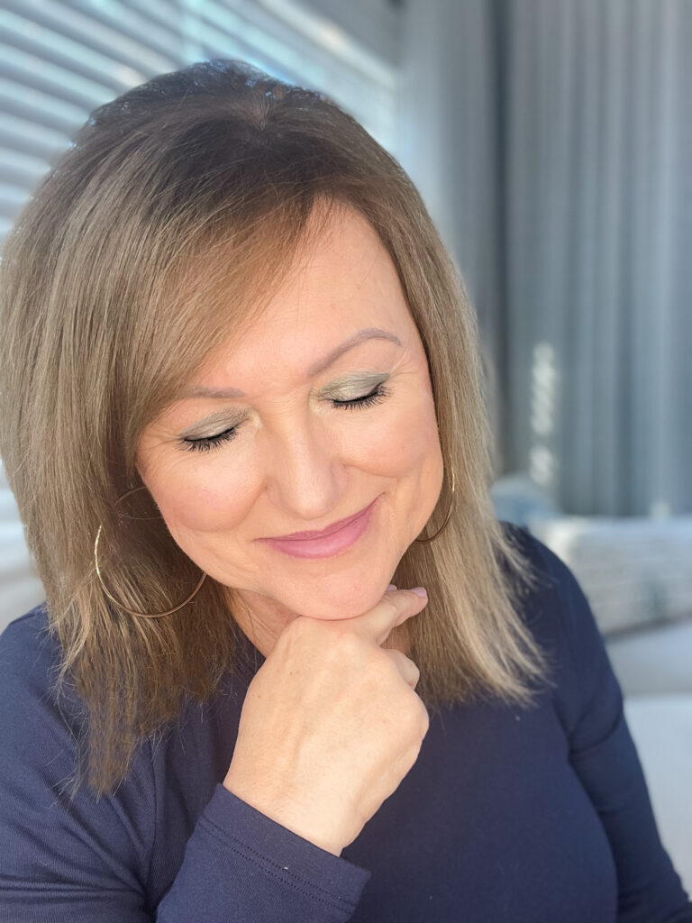 Woman wearing green eyeshadow