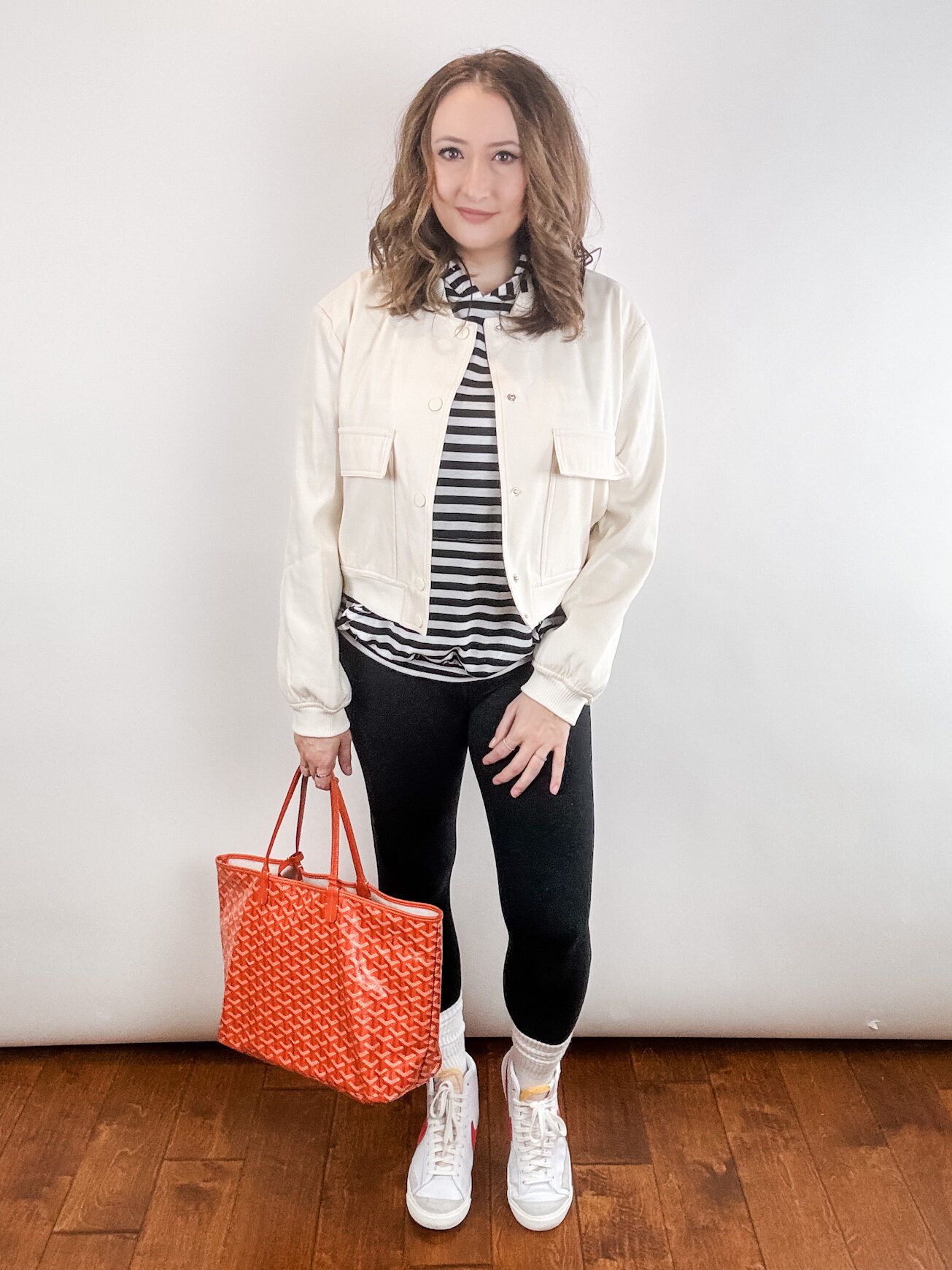 woman wearing bomber jacket